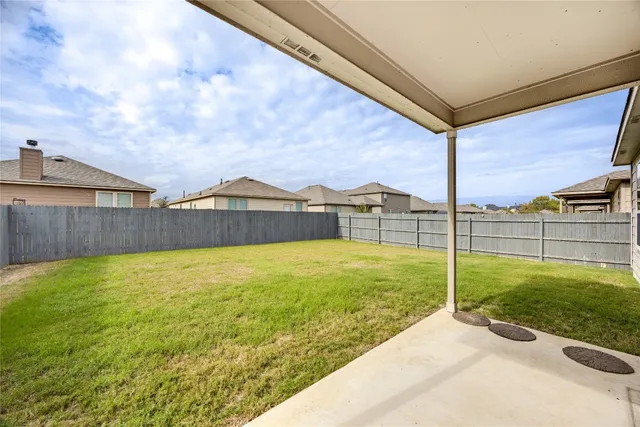 a house view with a garden space