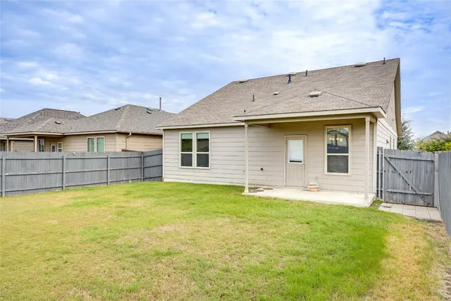 front view of house with a yard