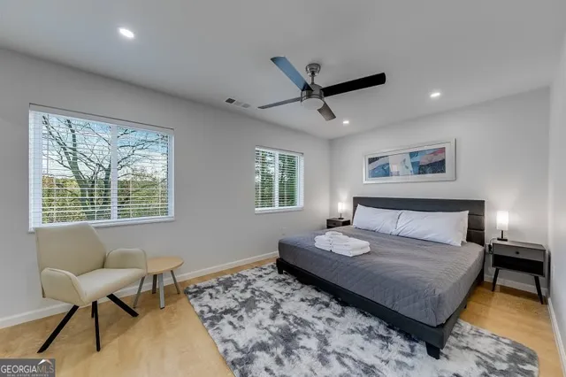 a bedroom with a bed and furniture