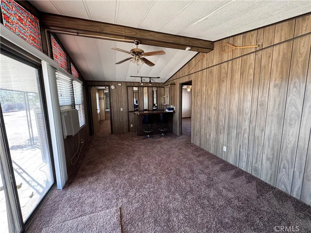 a kitchen with stainless steel appliances granite countertop a stove and a refrigerator