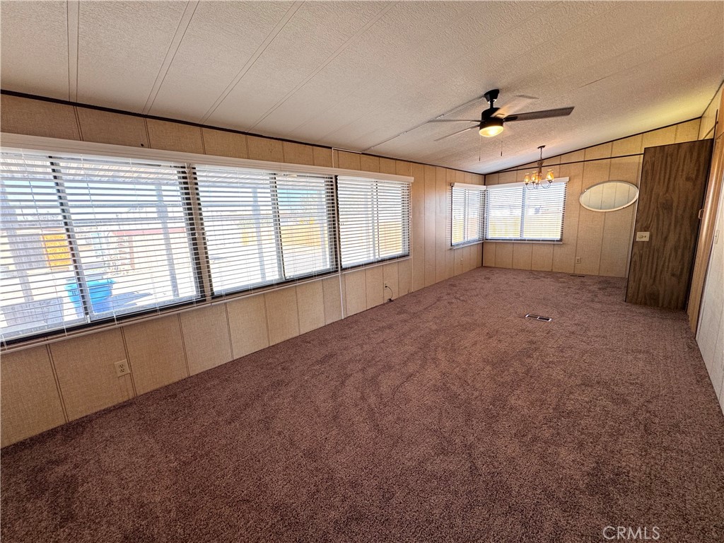 25544 Jasper Road Barstow, CA 92311 - Photo 17 of 62 a view of an empty room with a window