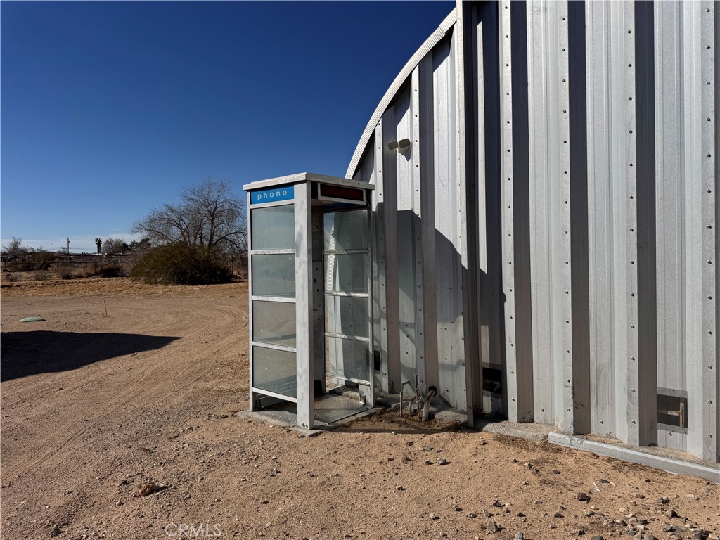 25544 Jasper Road Barstow, CA 92311 - Photo 52 of 62 a view of a house with a snow in the yard