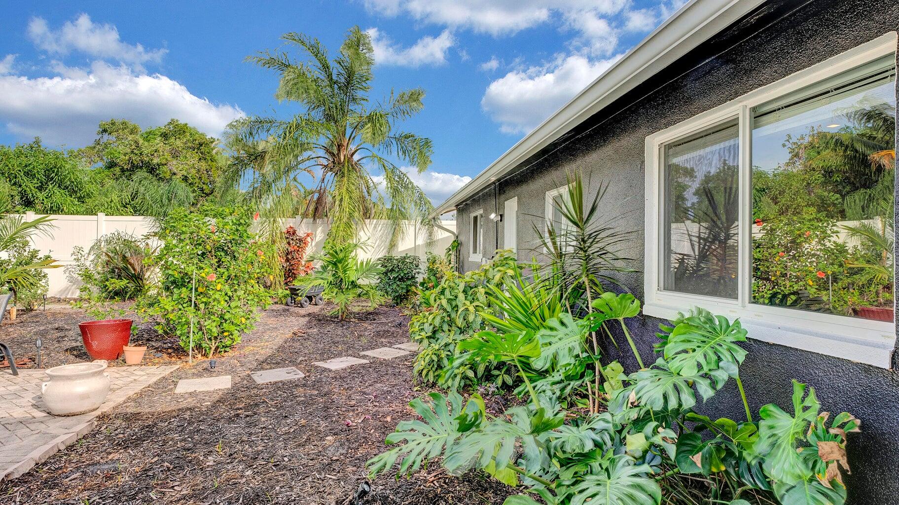 2941 Angler Drive Delray Beach, FL 33445 - Photo 24 of 34 a view of a backyard with plants