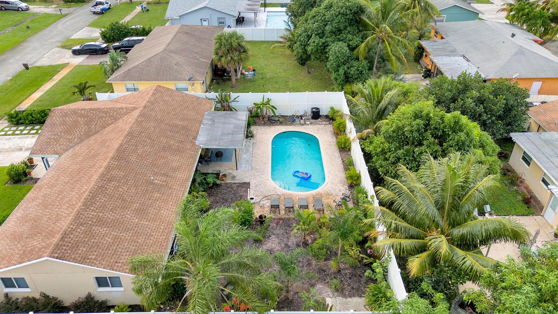 2941 Angler Drive Delray Beach, FL 33445 - Photo 25 of 34 an aerial view of a house