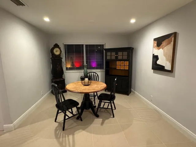 a bedroom with a bed and dresser