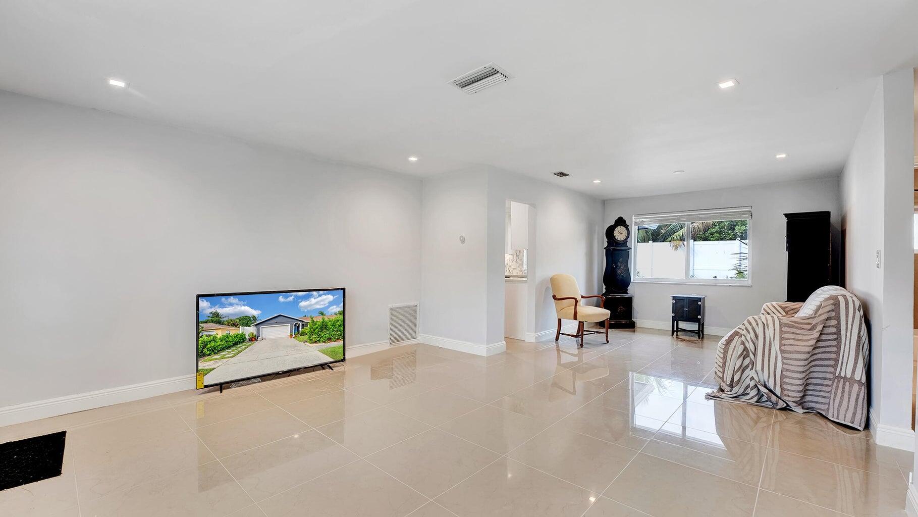 2941 Angler Drive Delray Beach, FL 33445 - Photo 7 of 34 a view of livingroom with furniture and window