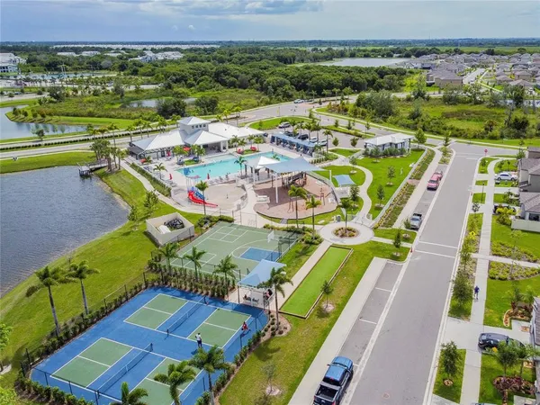 a view of an outdoor space pool patio and outdoor seating