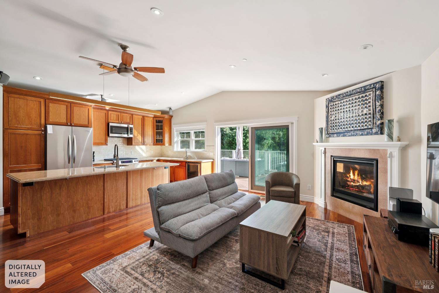 4920 Warm Springs Road Glen Ellen, CA 95442 - Photo 7 of 50 Open plan concept with dining bar, ample counters and cabinetry, convenient to dining room and outdoor dining area too, Great room with fireplace separates primary suite and guest bedrooms.