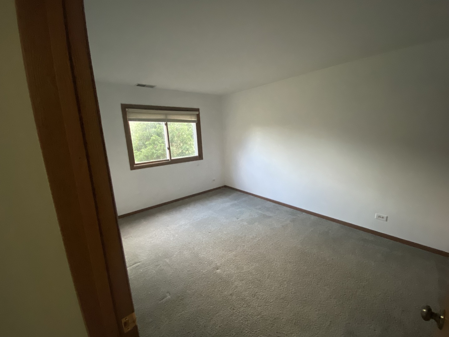763 Cimarron Drive Cary, IL 60013 - Photo 11 of 15 an empty room with windows