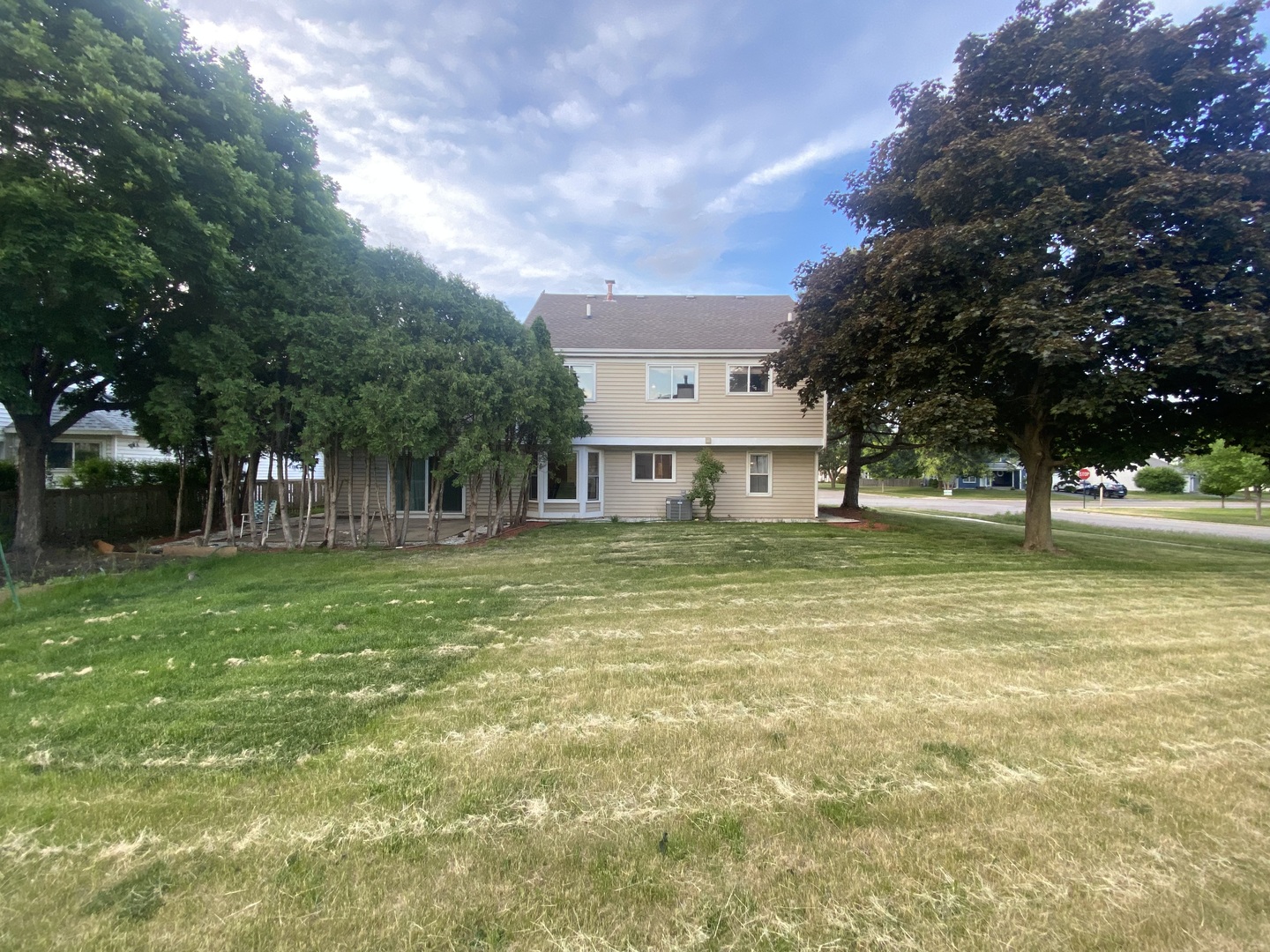 763 Cimarron Drive Cary, IL 60013 - Photo 14 of 15 a view of a house with a yard