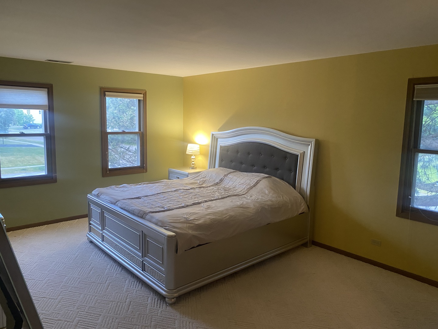 763 Cimarron Drive Cary, IL 60013 - Photo 7 of 15 a bedroom with a bed and window