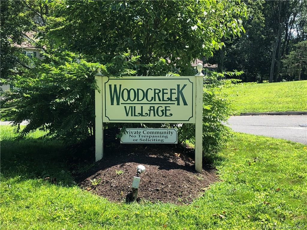 45 Prange Road, Unit 45 Brookfield, CT 06804 - Photo 1 of 1 a sign on the side of the road