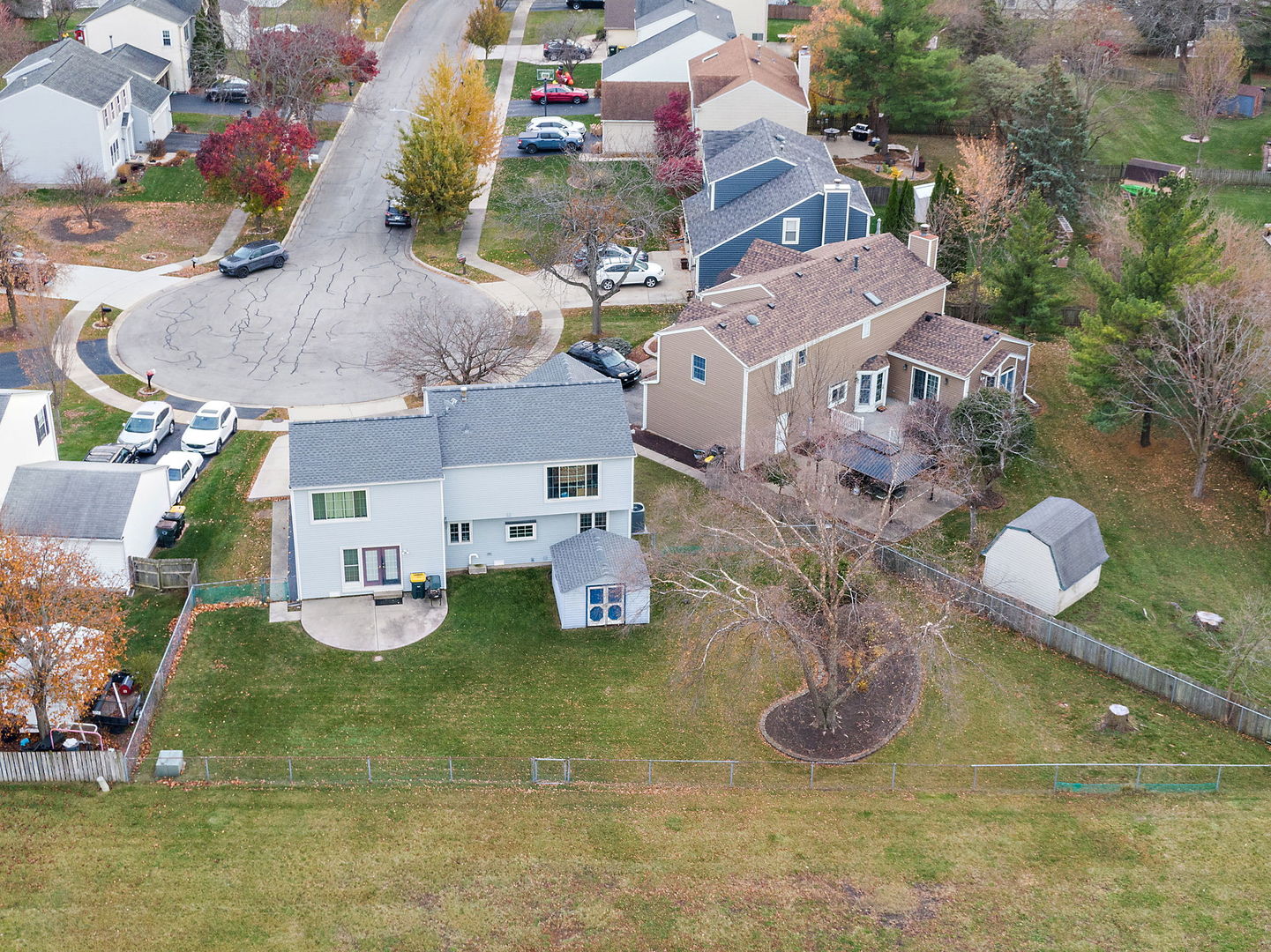 1340 Nantucket Court Carol Stream, IL 60188 - Photo 14 of 15 an aerial view of a house with swimming pool and big yard