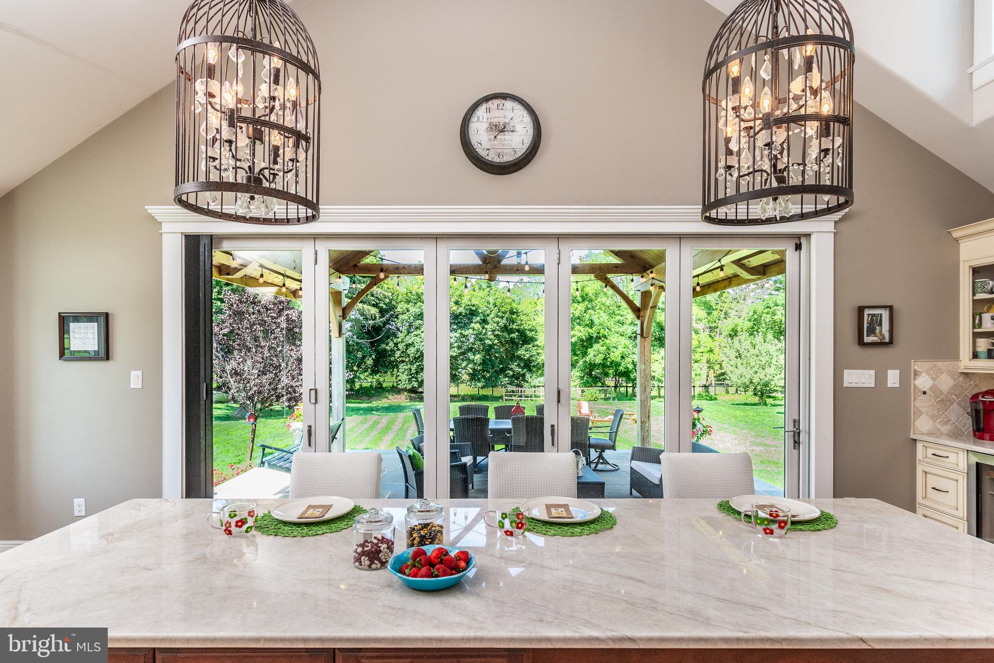 2969 Windy Bush Road Newtown, PA 18940 - Photo 43 of 124 A Wall of Nanawall Doors Lead to Kitchen Patio