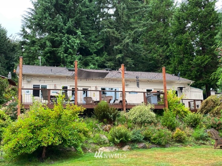 405 West Shore Loop Road Snohomish, WA 98290 - Photo 1 of 1 an aerial view of a house with a garden