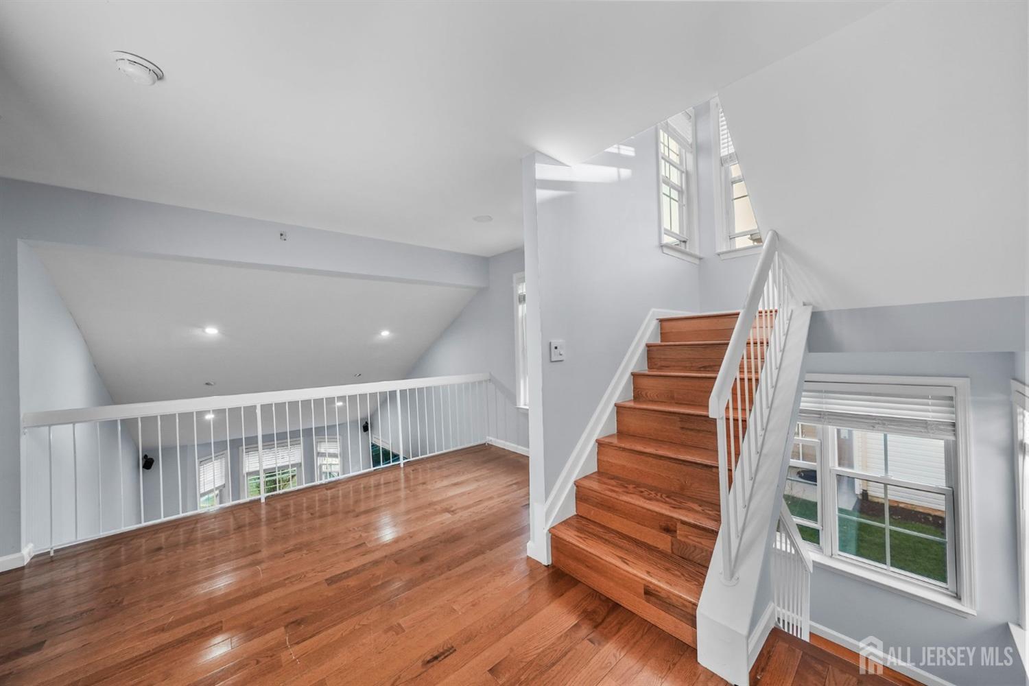 215 Nebula Road Piscataway, NJ 08854 - Photo 25 of 37 a view of entryway and hall with wooden floor