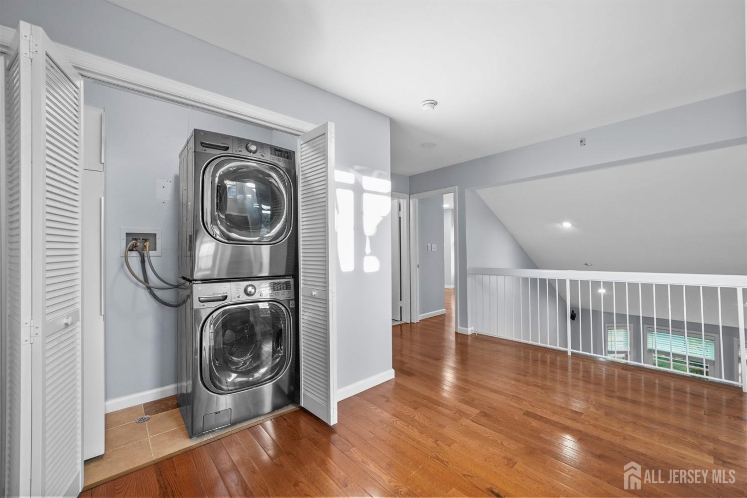 215 Nebula Road Piscataway, NJ 08854 - Photo 26 of 37 a view of a hallway with washer and dryer