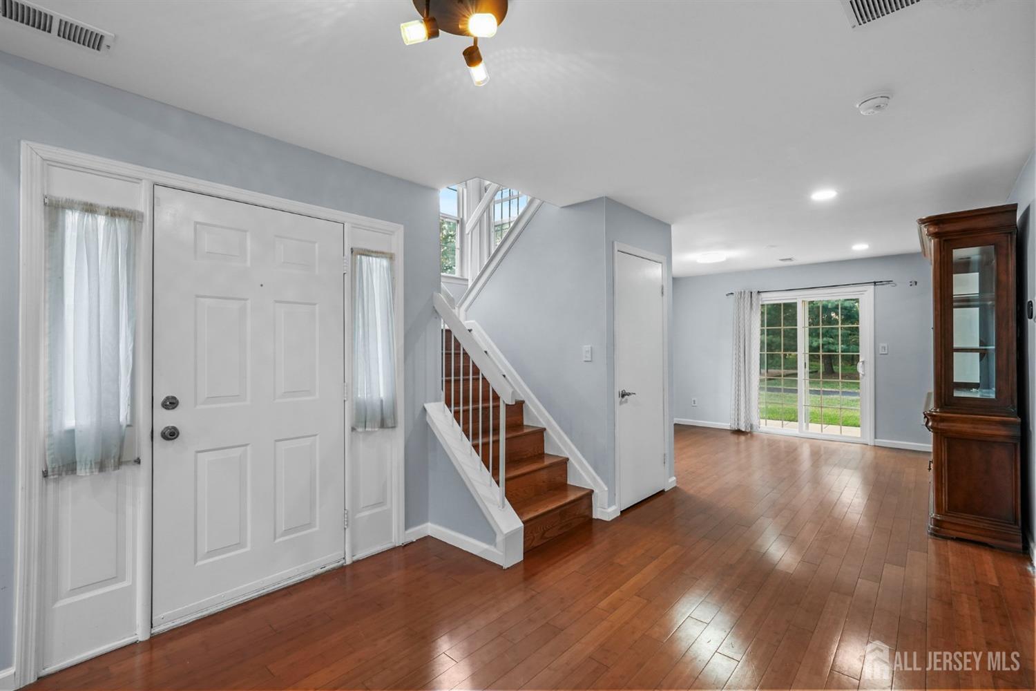 215 Nebula Road Piscataway, NJ 08854 - Photo 9 of 37 a view of an entryway with wooden floor