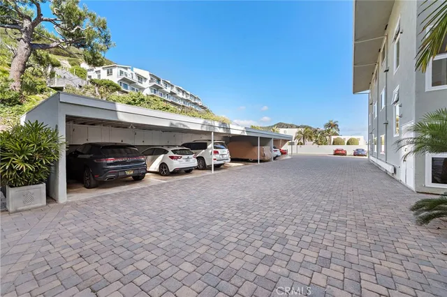 a view of street with parked cars