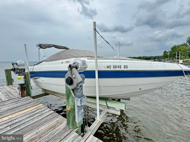 a living room with a couch and a fireplace