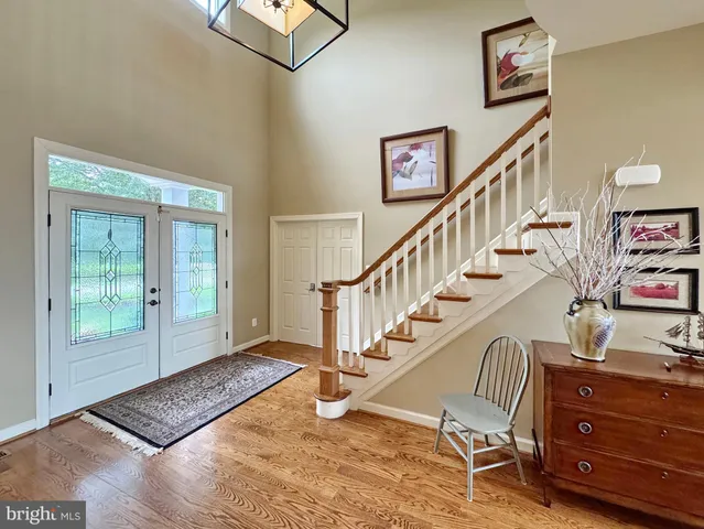 a kitchen with stainless steel appliances granite countertop sink stove top oven and cabinets