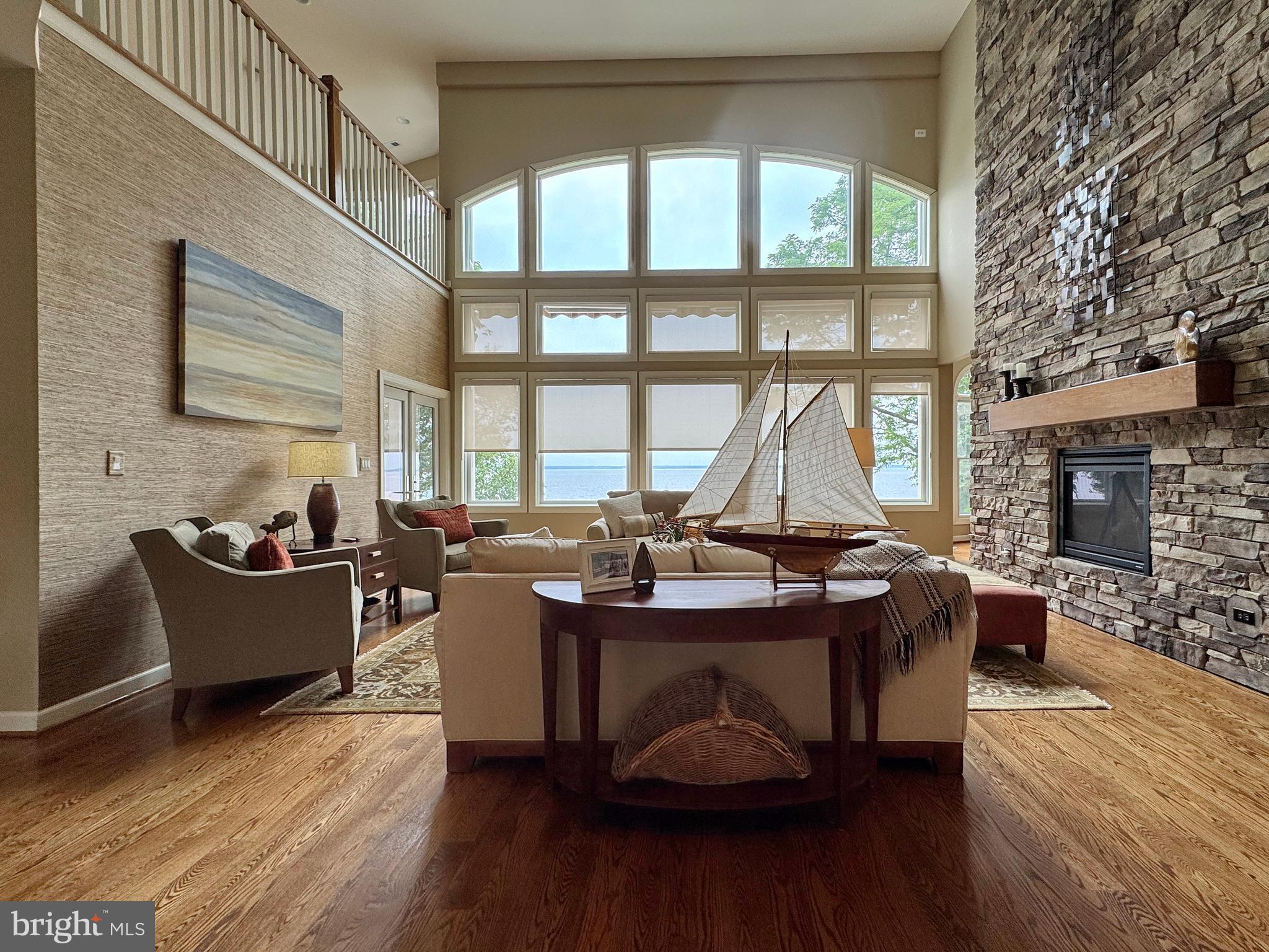 11660 Bachelors Hope Court Issue, MD 20645 - Photo 27 of 82 a view of a livingroom with furniture and a fireplace