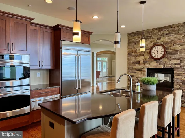 a bathroom with a shower and a sink