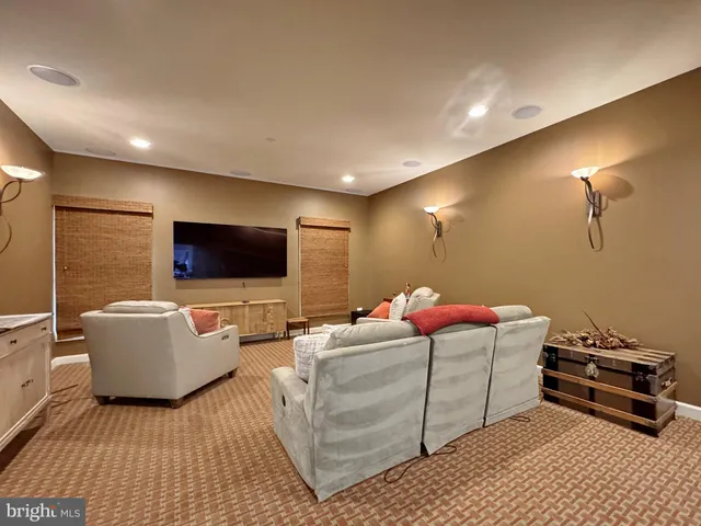 a bedroom with a bed and flat screen tv