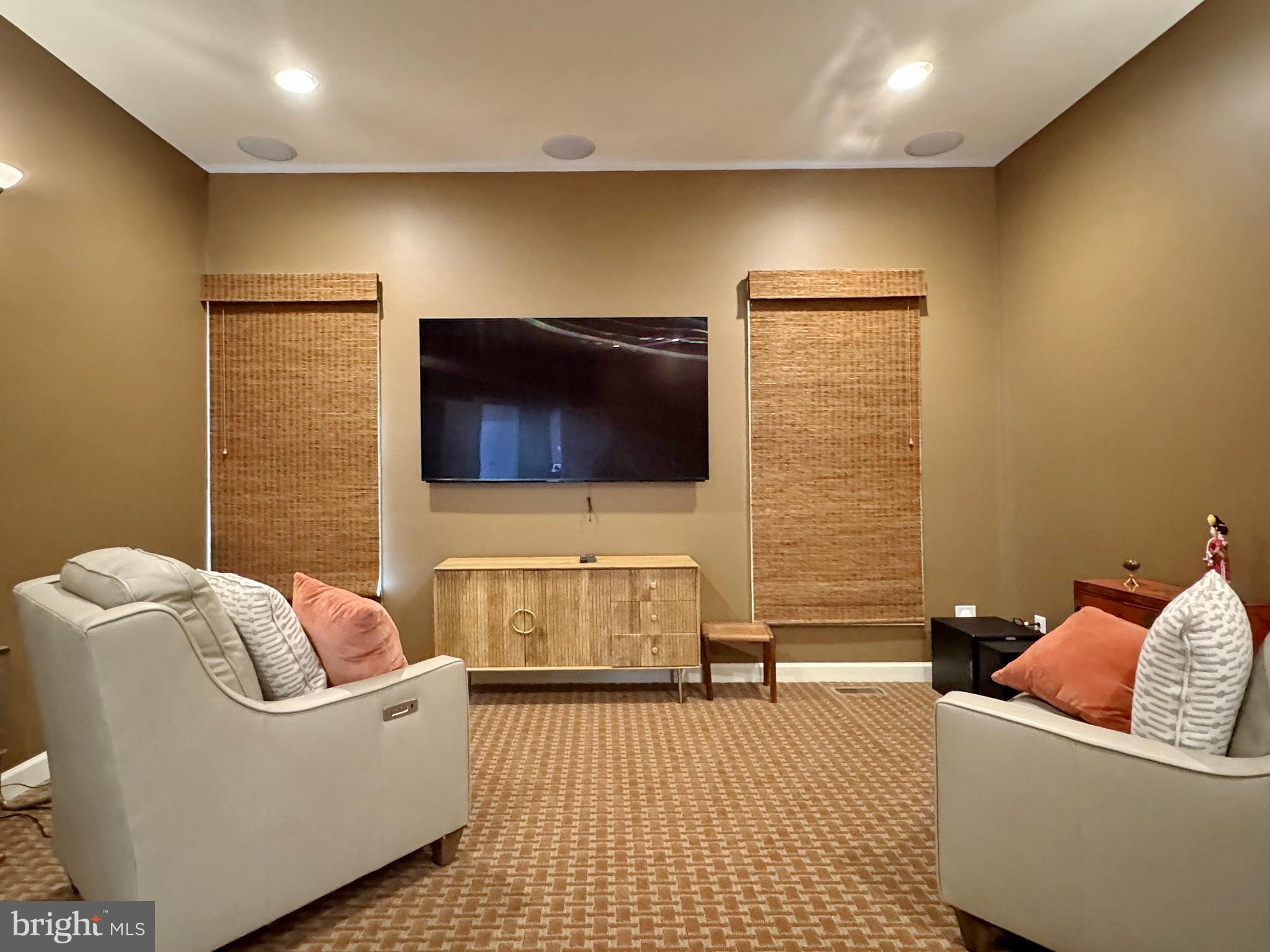 11660 Bachelors Hope Court Issue, MD 20645 - Photo 45 of 82 a living room with a couch and a flat screen tv