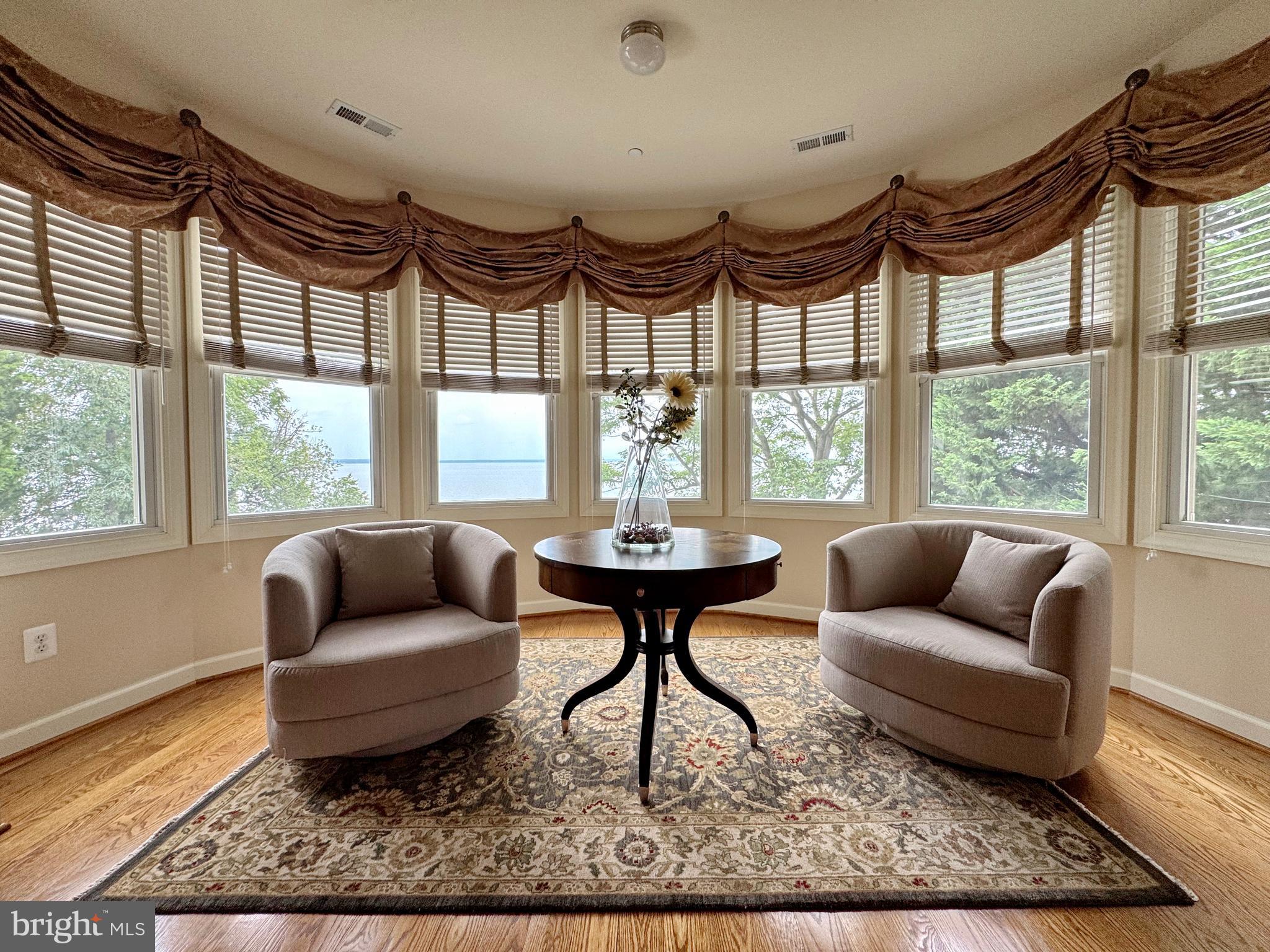 11660 Bachelors Hope Court Issue, MD 20645 - Photo 52 of 82 a living room with furniture and a large window
