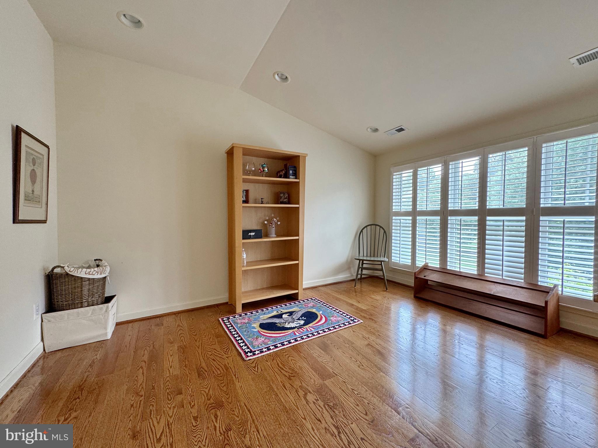 11660 Bachelors Hope Court Issue, MD 20645 - Photo 62 of 82 a room with a bed and a large window