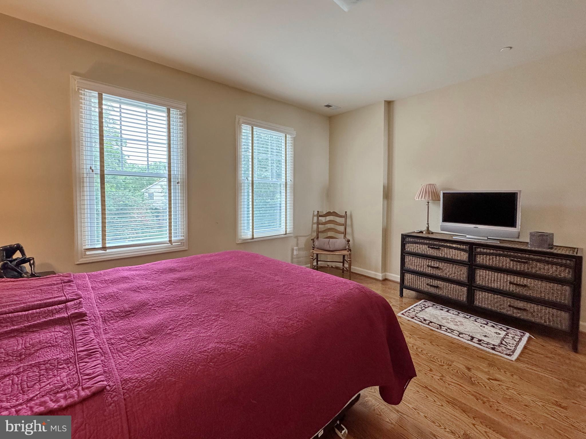 11660 Bachelors Hope Court Issue, MD 20645 - Photo 69 of 82 a bedroom with a bed and flat screen tv