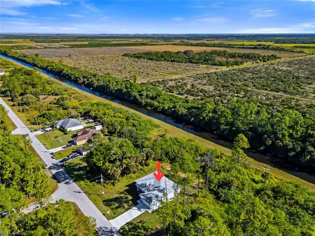 $345,000 | 425 Naples Avenue South, Lehigh Acres, FL 33974