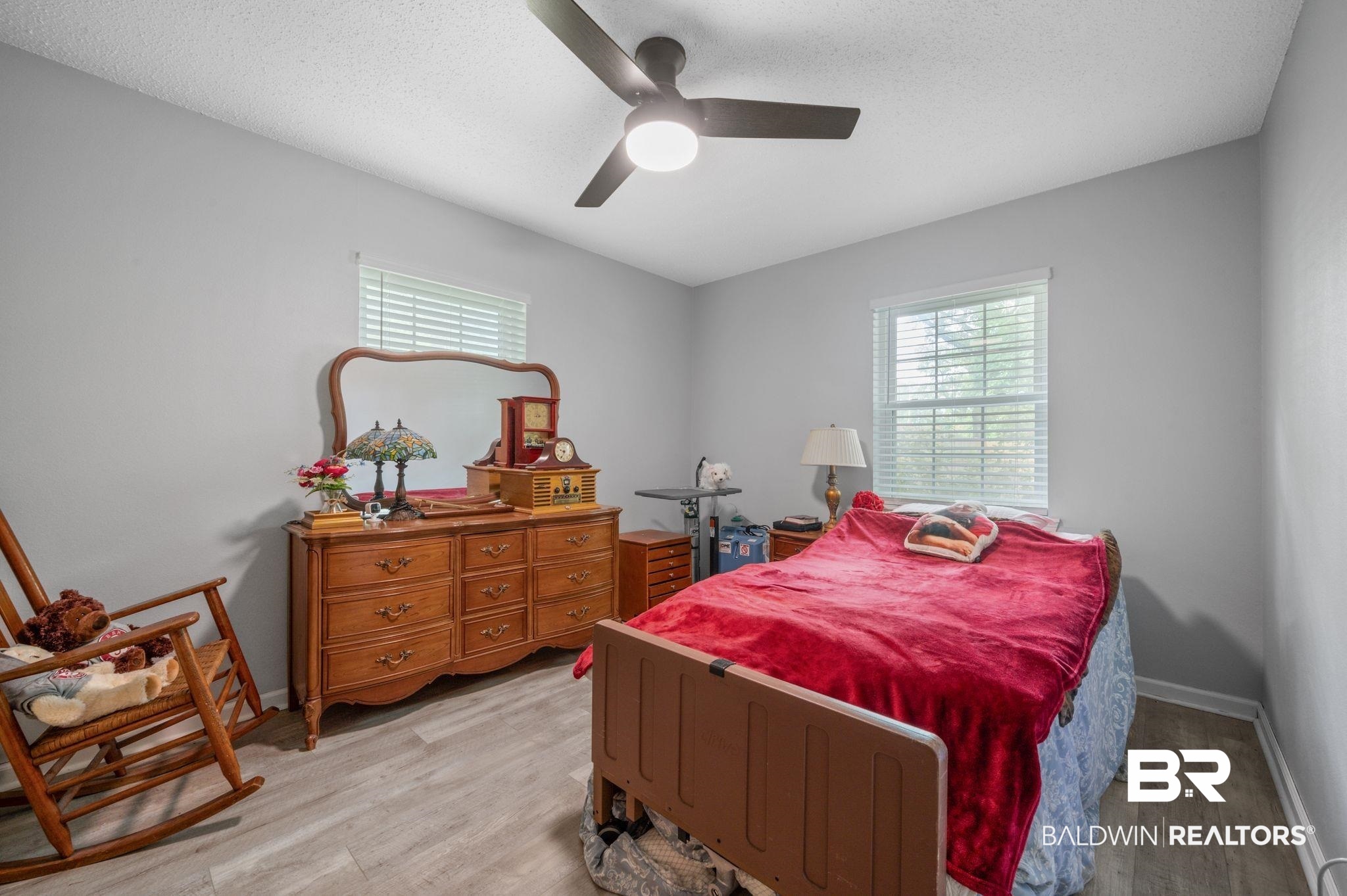620 Southern Way Spanish Fort, AL 36527 - Photo 12 of 18 Bedroom with light hardwood / wood-style flooring and ceiling fan