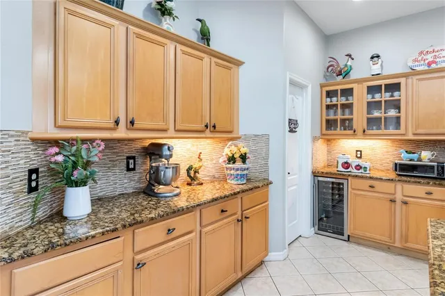 a kitchen with granite countertop lots of counter top space