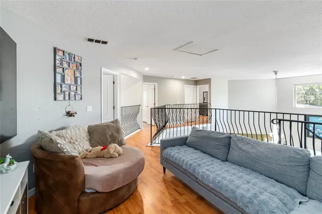 a workspace with furniture and a window