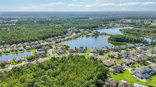 a front view of house with a garden