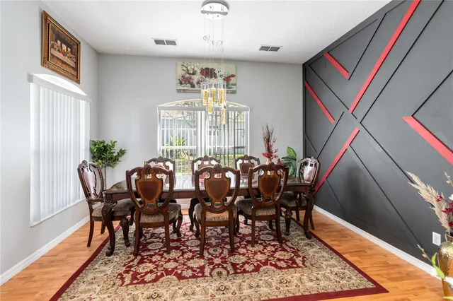 a kitchen with stainless steel appliances granite countertop a stove and a sink