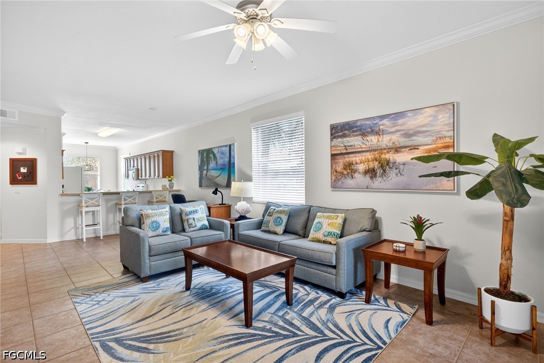 8251 Pathfinder Loop, Unit 621 Fort Myers, FL 33919 - Photo 25 of 30 a living room with furniture and wooden floor