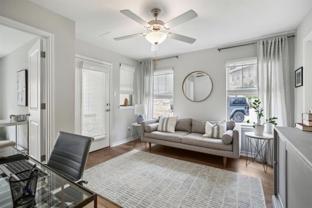 332 Adams Street Georgetown, TX 78628 - Photo 16 of 37 A versatile living space with wood flooring and natural light offers comfort and functionality.