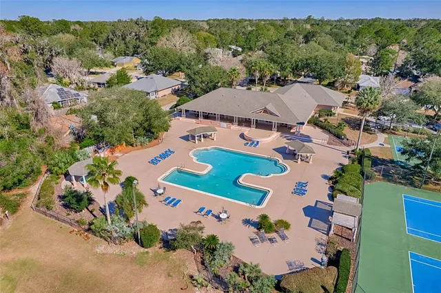 an aerial view of a house with a garden