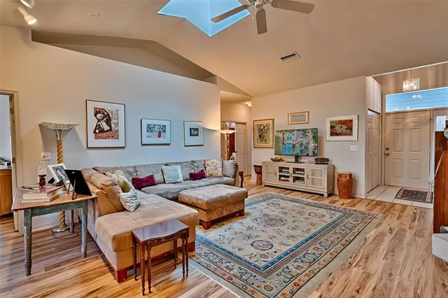 a living room with furniture and a rug