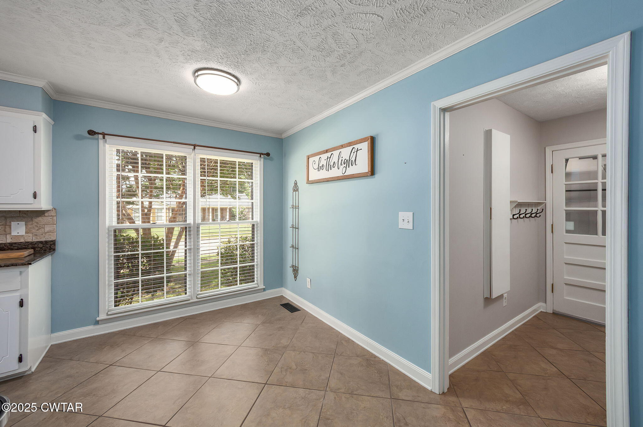 6 Jamestown Drive Jackson, TN 38305 - Photo 14 of 32 a view of an empty room with a window