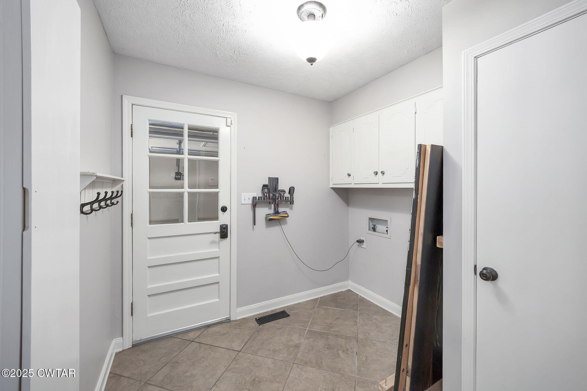 6 Jamestown Drive Jackson, TN 38305 - Photo 16 of 32 a view of walk in closet with empty racks