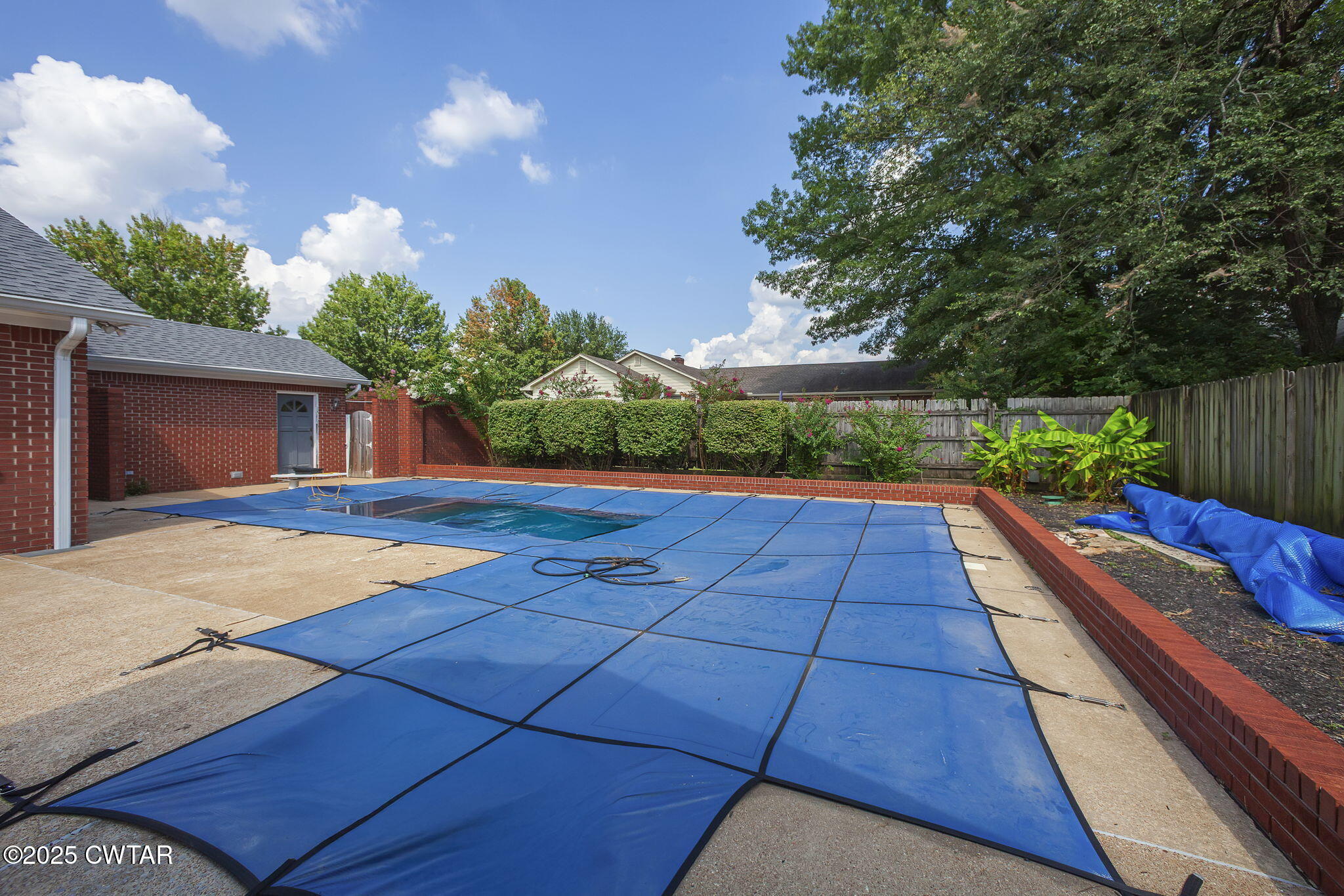 6 Jamestown Drive Jackson, TN 38305 - Photo 29 of 32 a view of a backyard with sitting area