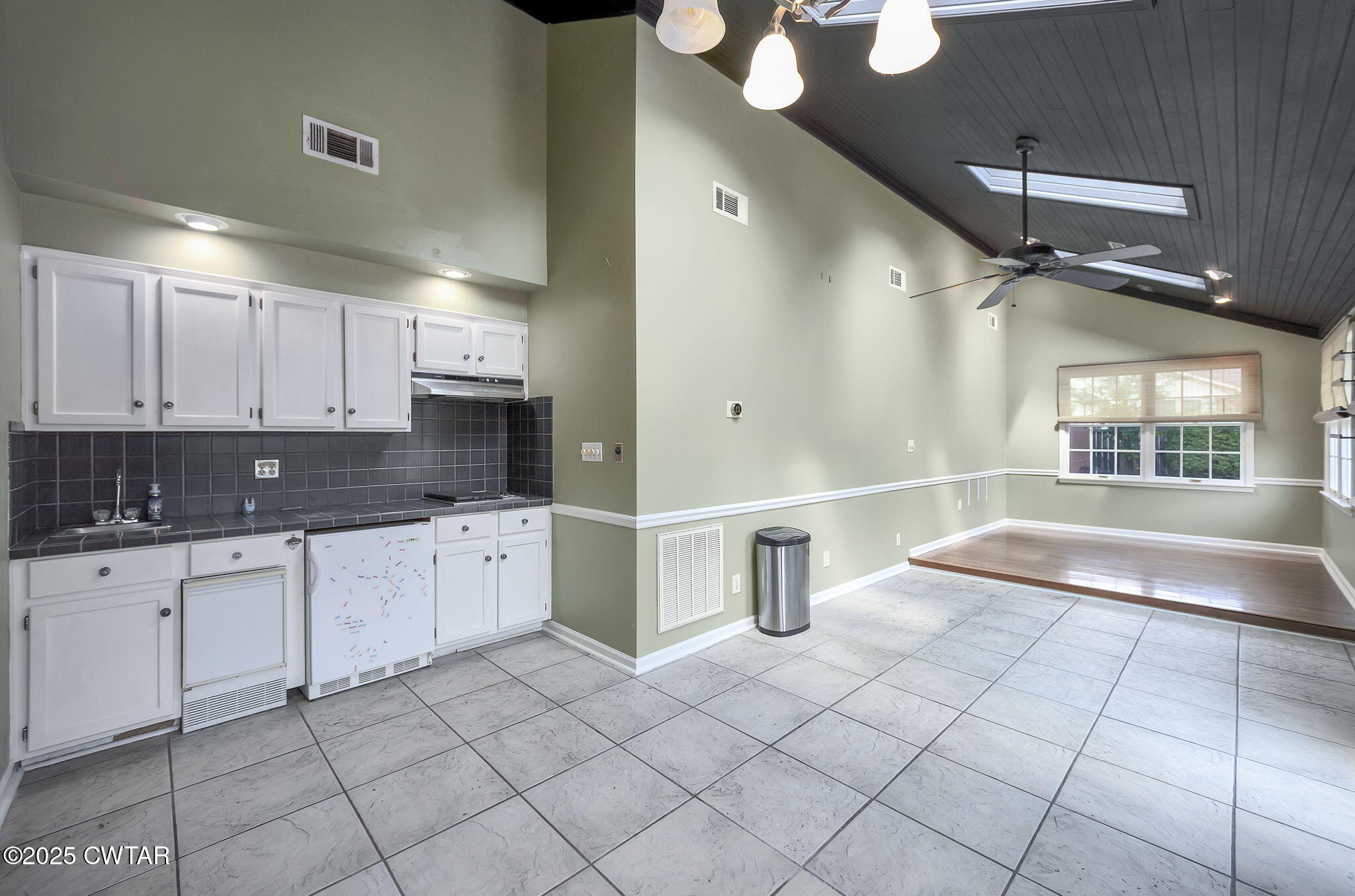 6 Jamestown Drive Jackson, TN 38305 - Photo 30 of 32 a large kitchen with cabinets and glass door