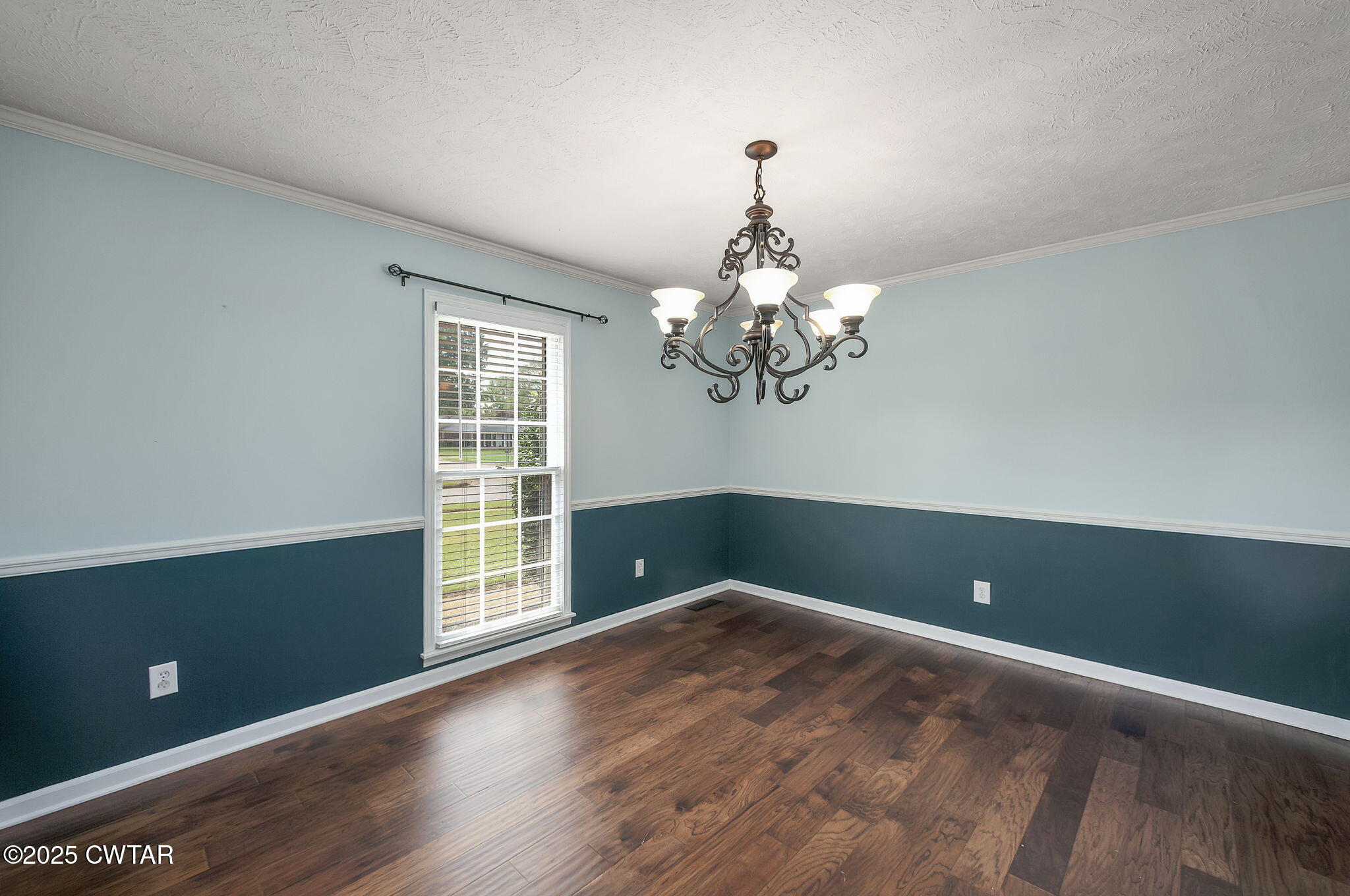 6 Jamestown Drive Jackson, TN 38305 - Photo 7 of 32 a view of wooden floor and chandelier in a room