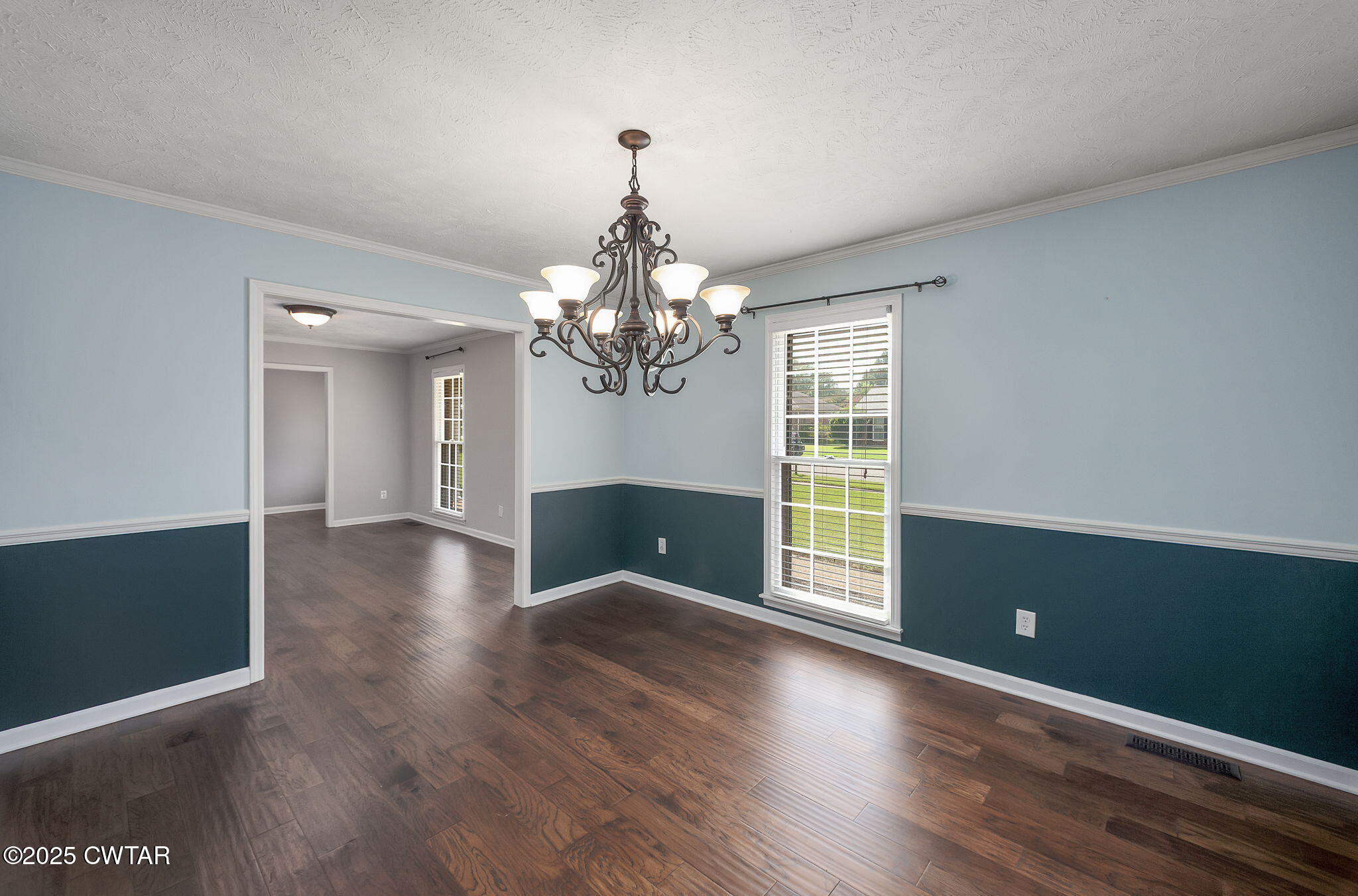 6 Jamestown Drive Jackson, TN 38305 - Photo 8 of 32 a view of livingroom with window and hardwood floor