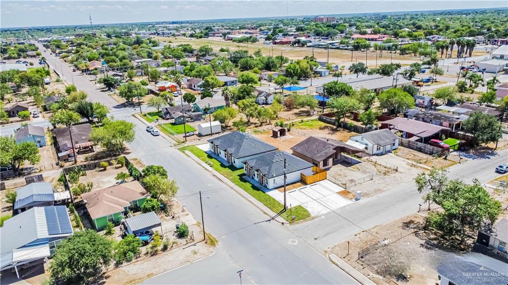 1046 Hidalgo Street Mercedes, TX 78570 - Photo 21 of 21 an aerial view of residential houses with outdoor space
