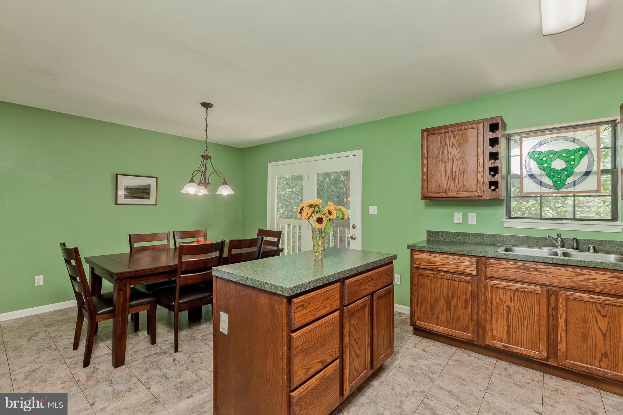 10627 Old Barn Road New Market, MD 21774 - Photo 7 of 30 Kitchen into Dining Room